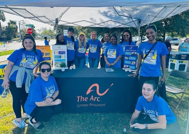 Education First Employees volunteering at The Buddy Walk in downtown Beaumont.